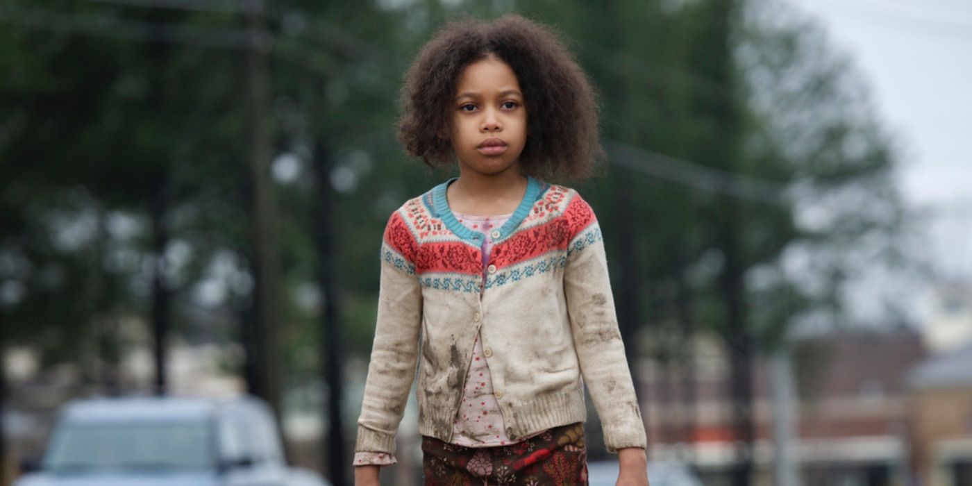 Joy Birch walks down the street in tattered clothes from Prisoners 