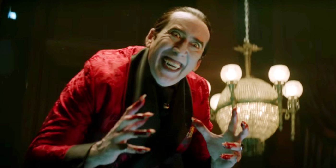 Nicolas Cage smiling creepily as Dracula in Renfield.