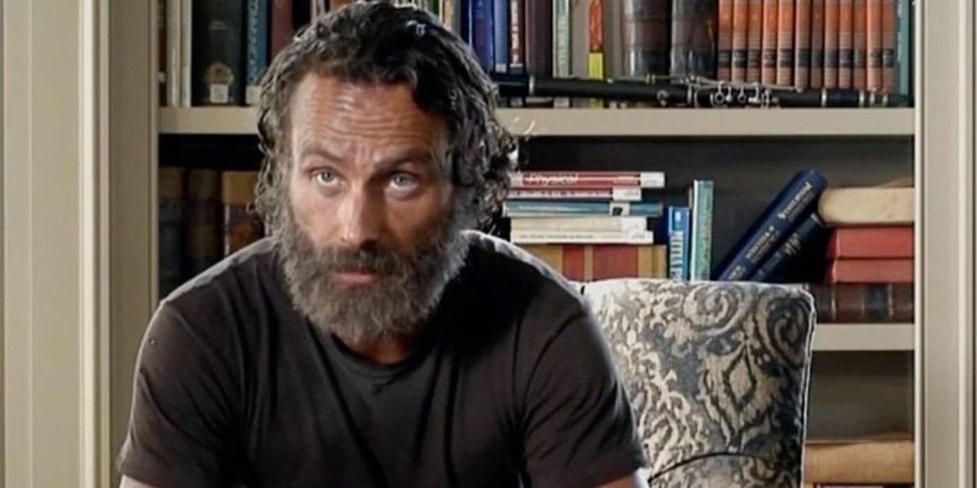 Rick with a beard talking to a video on Walking Dead.