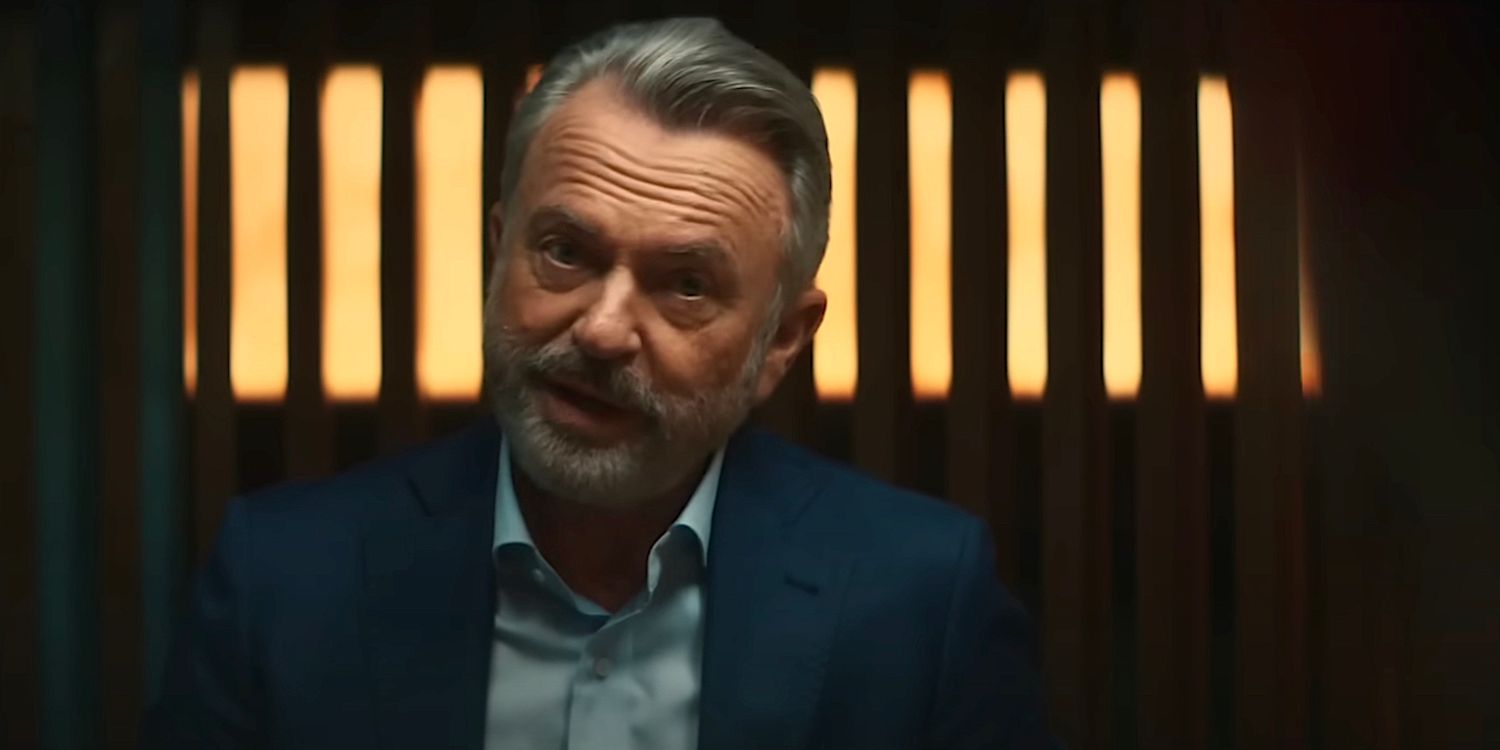 Sam Neill in a blue suit in Assassin Club