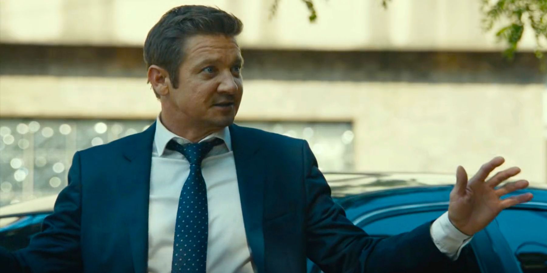 Jeremy Renner holding up his hands in Mayor of Kingstown Season 2 Episode 7