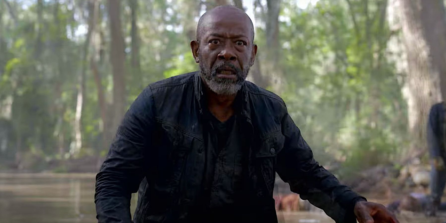 Morgan Jones is in a swamp looking scared in Fear the Walking Dead Season 8