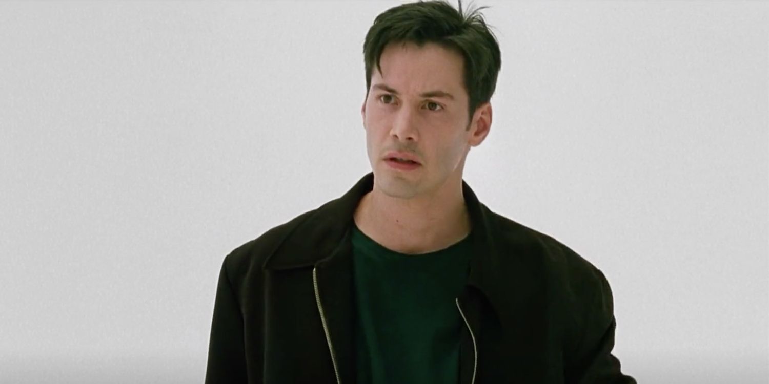 Keanu Reeves as Neo looking serious in The Matrix