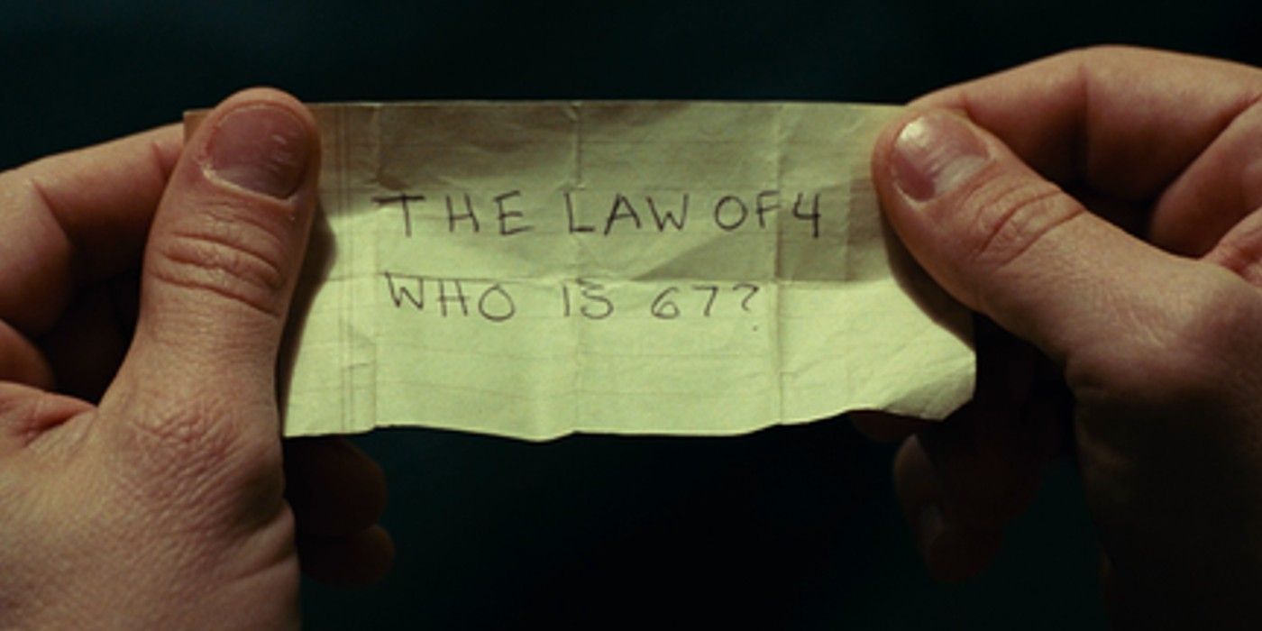 Teddy holding a note about Patient 67 in Shutter Island