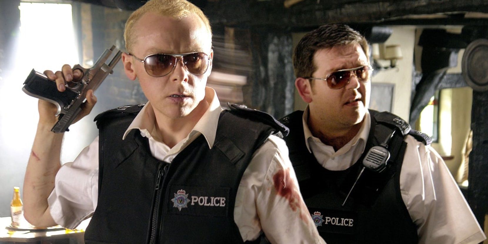 Simon Pegg and Nick Frost with guns in Hot Fuzz