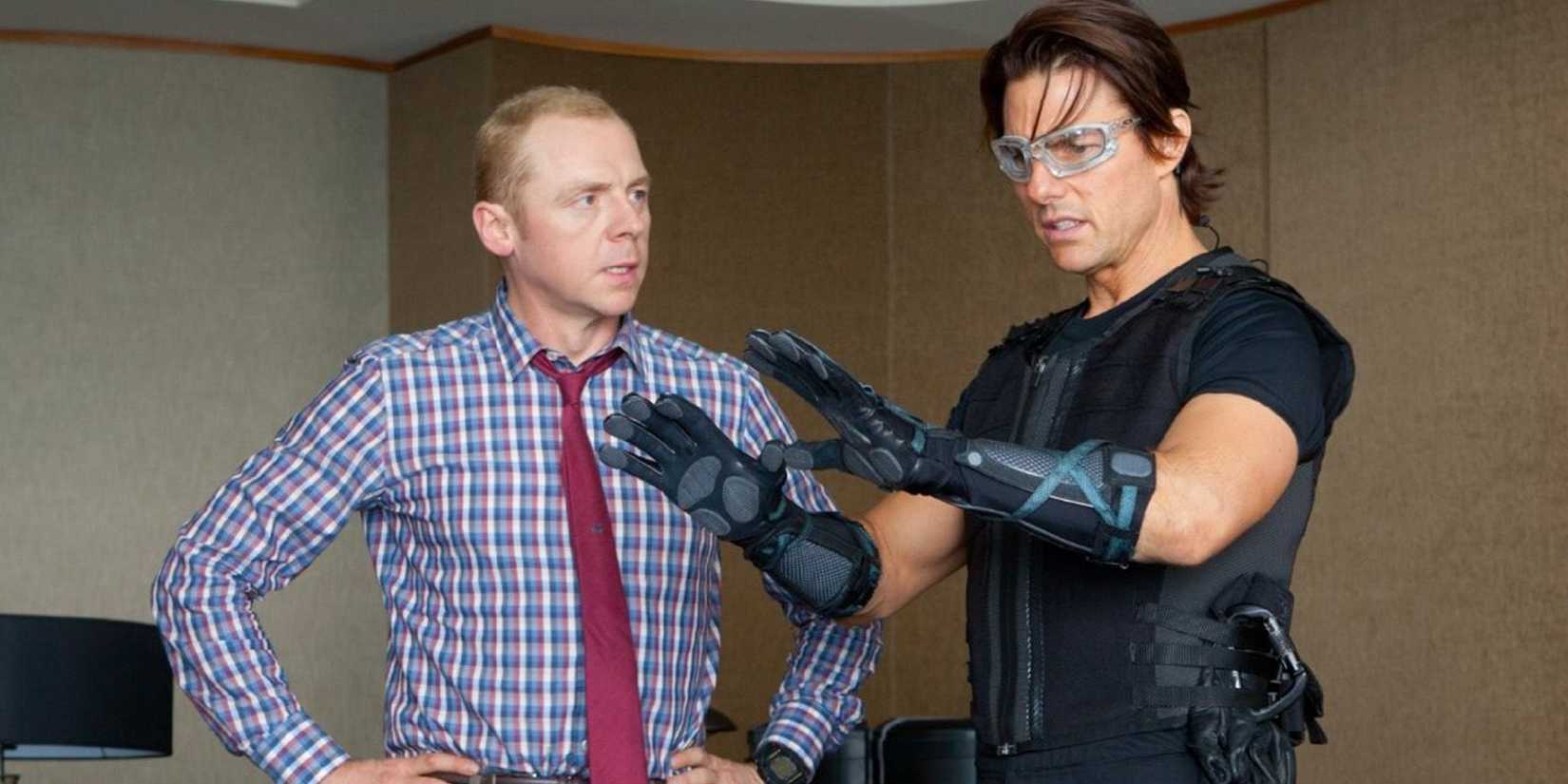 Simon Pegg gives Tom Cruise a pair of high-tech gloves in Mission Impossible Ghost Protocol