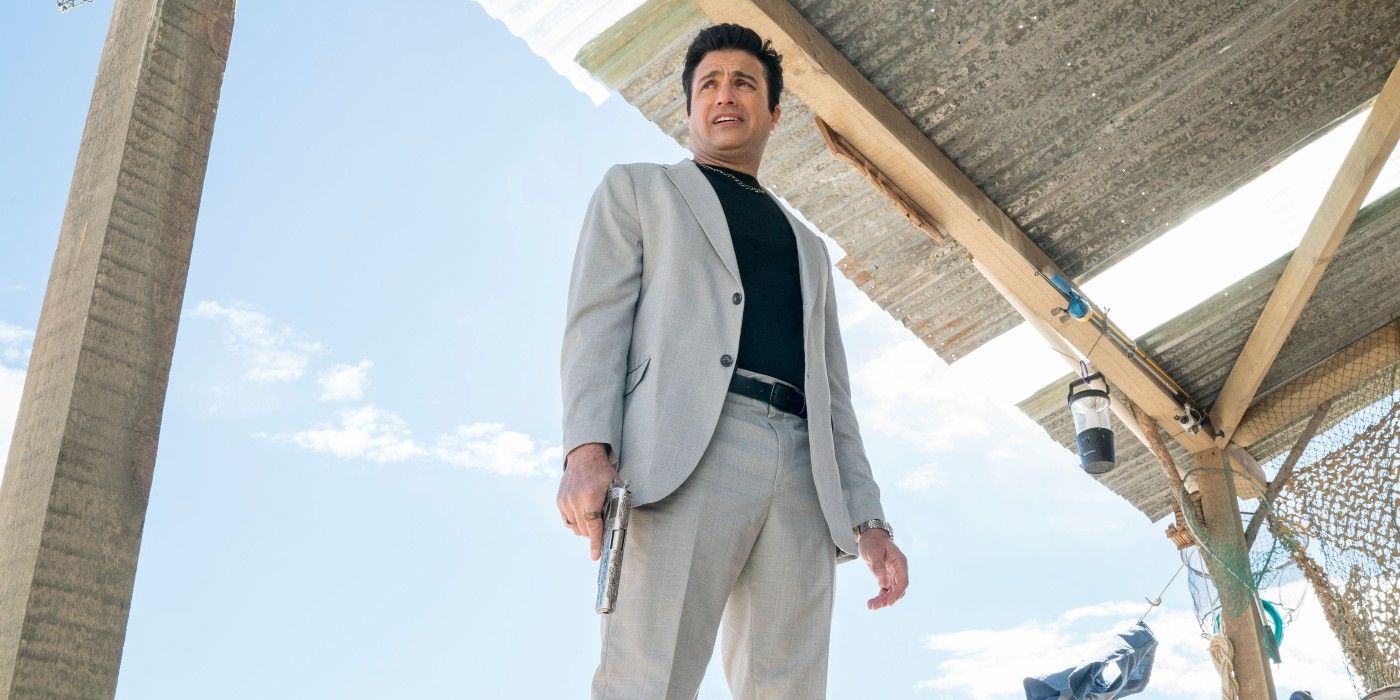 Snag&rsquo;s character Marco holding a gun and looking into the distance.