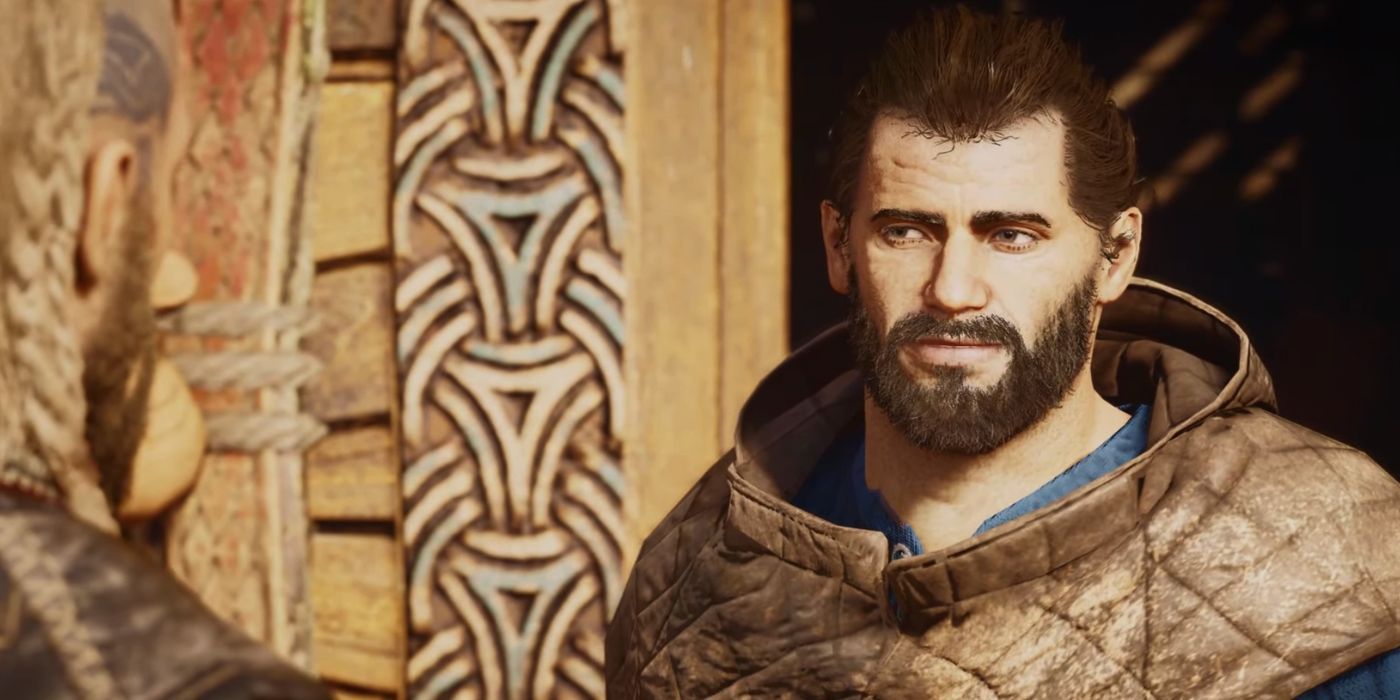 Tarben from Assassin's Creed Valhalla speaking to the player with a smirk on his face.