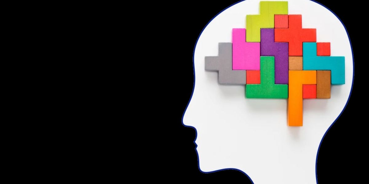 Otak Tetris, latar belakang hitam dengan siluet putih kepala yang memiliki potongan tetris di otaknya