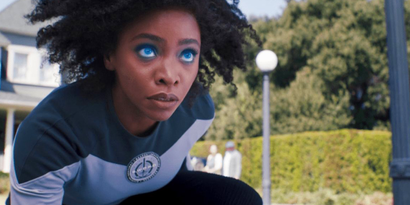 Monica Rambeau crouched, with her eyes glowing blue after getting powers in WandaVision.