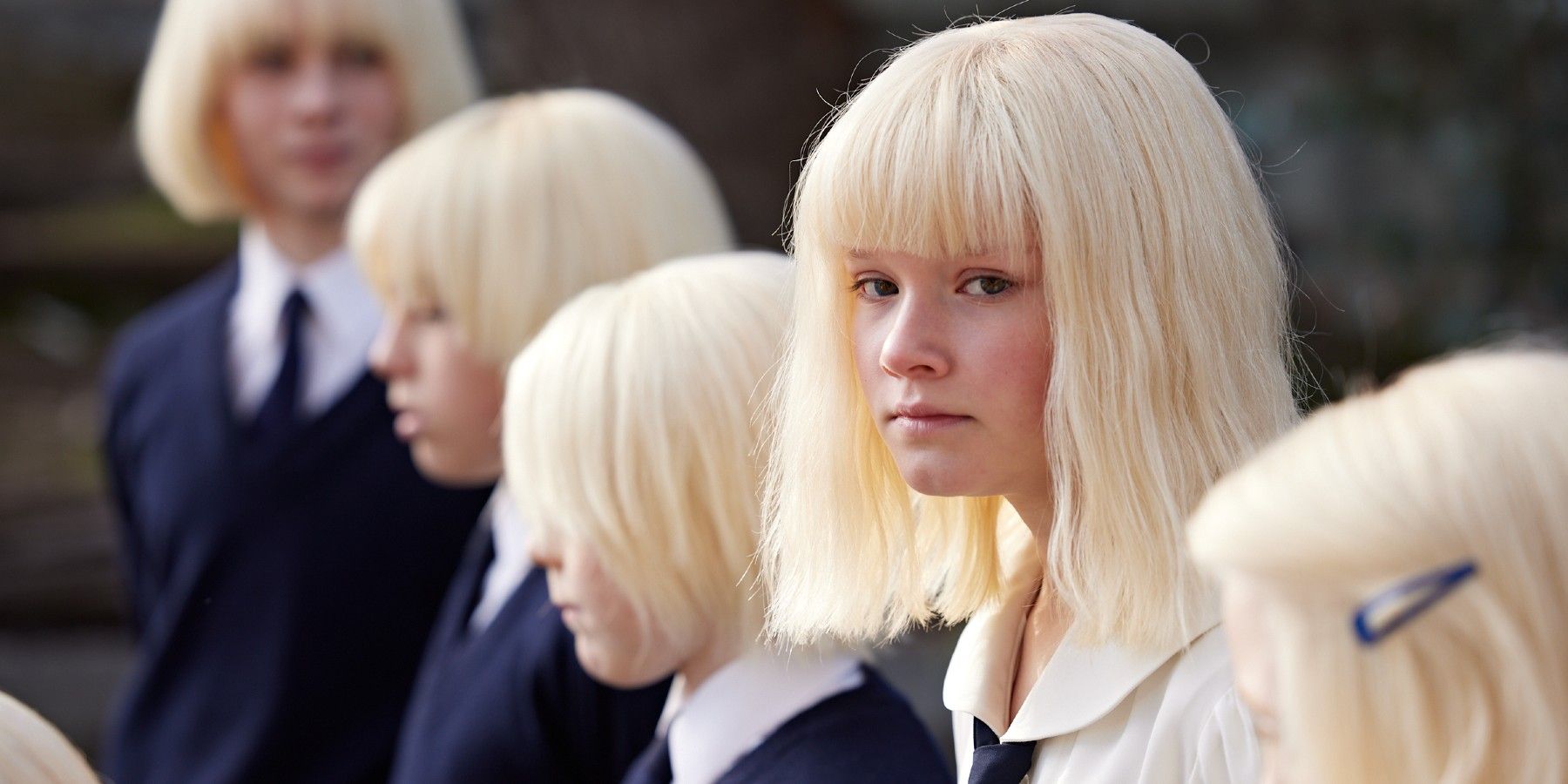 Young girls in white wig in The Clearing