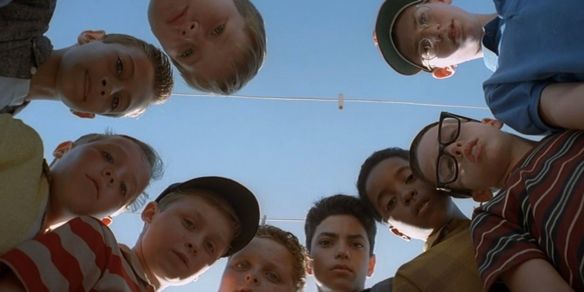 The kids of the Sandlot look down into the camera
