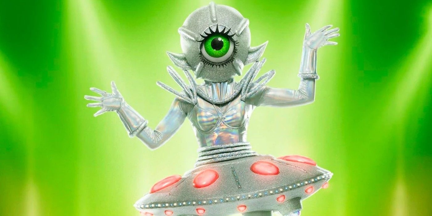 The Masked Singer Season 9 UFO posing against green background