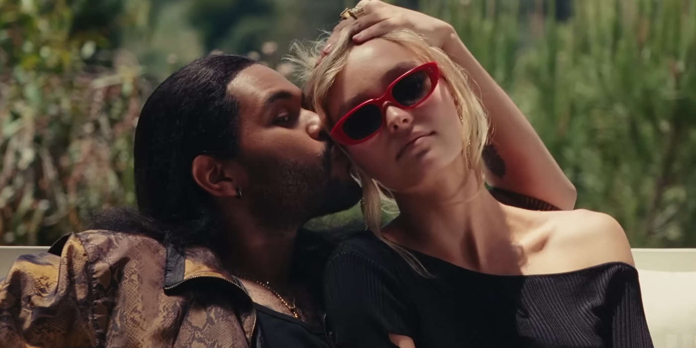 The Weeknd kissing Lily Rose Depp on the head in The Idol