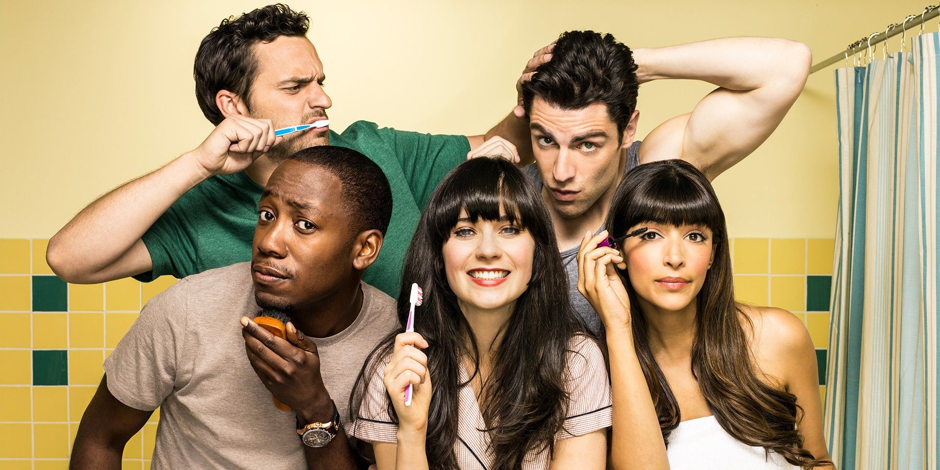 The cast of New Girl is on a poster.