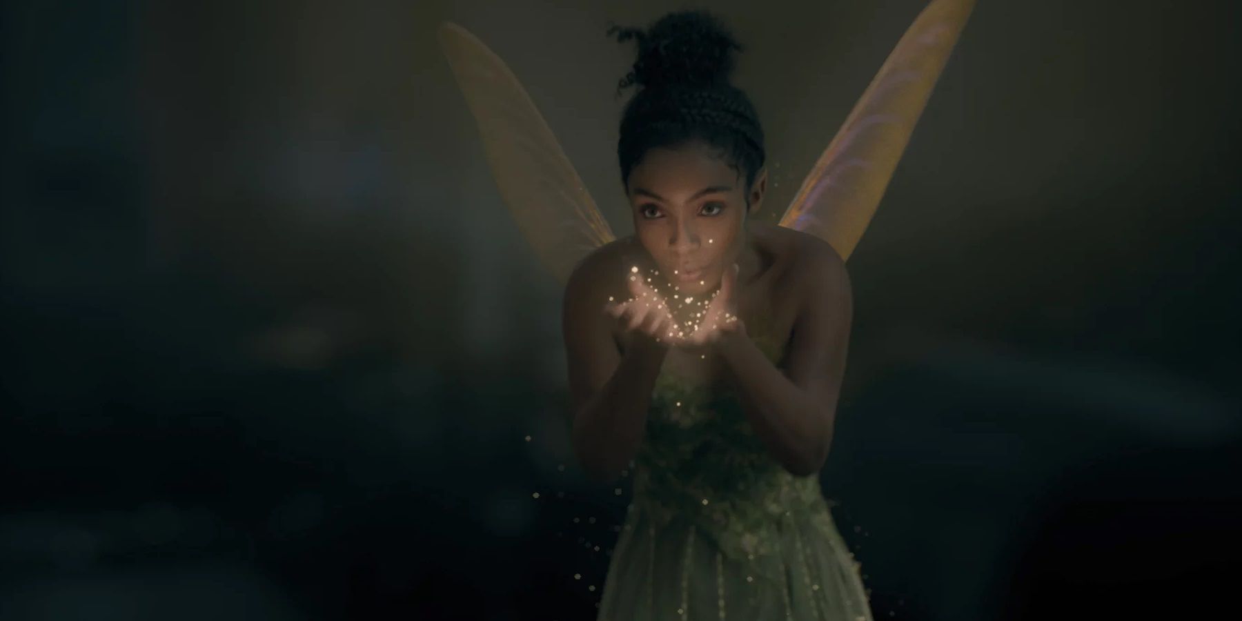 Live Action Tinkerbell with fairy dust in Peter Pan and Wendy