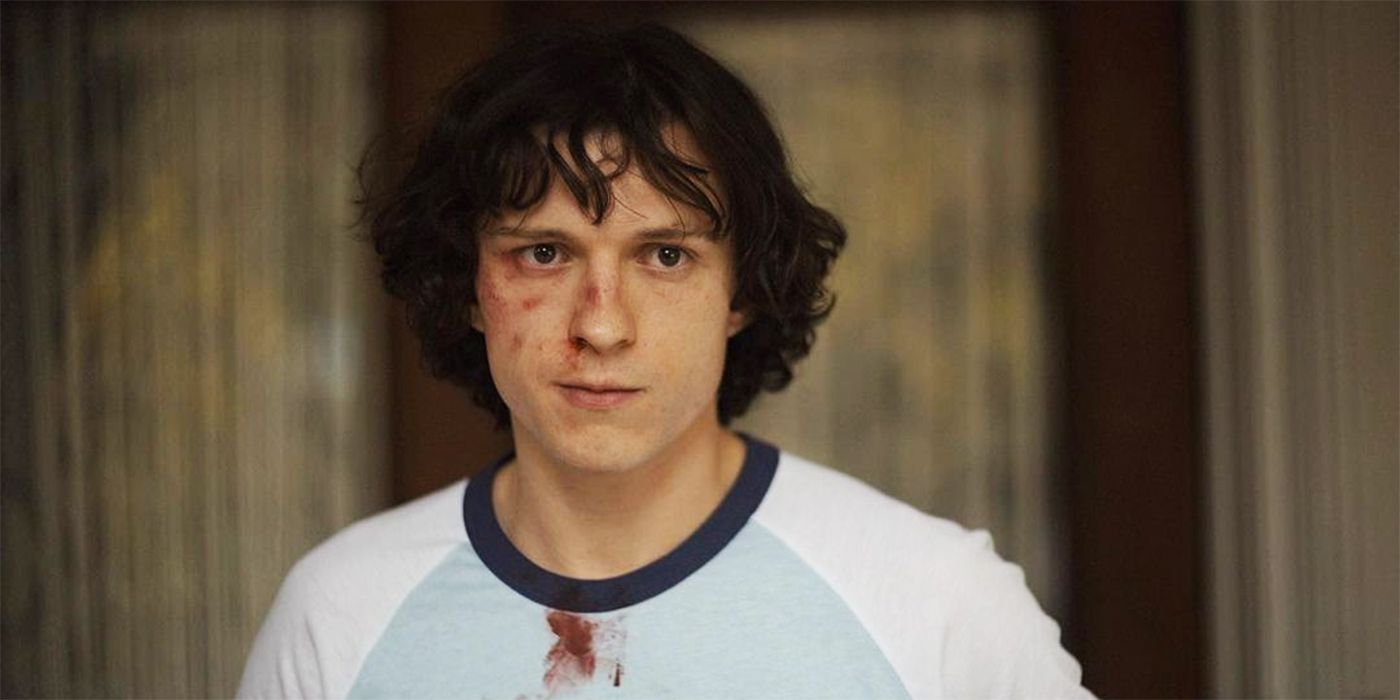 Tom Holland with bruises and blood in The Crowded Room