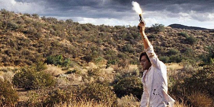 Tony firing a gun in the air in Nocturnal Animals