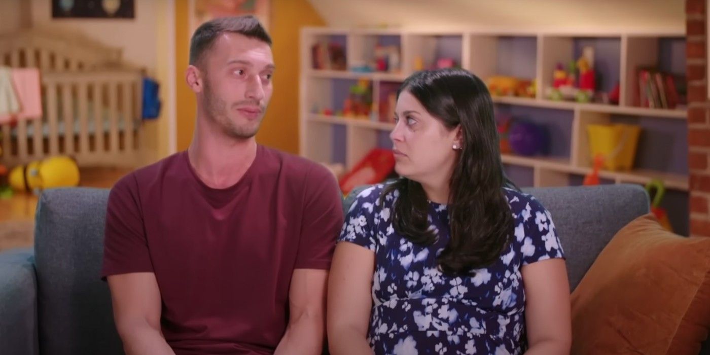 Loren & Alexei Brovarnik on 90 day Fiance sitting on couch looking at each other