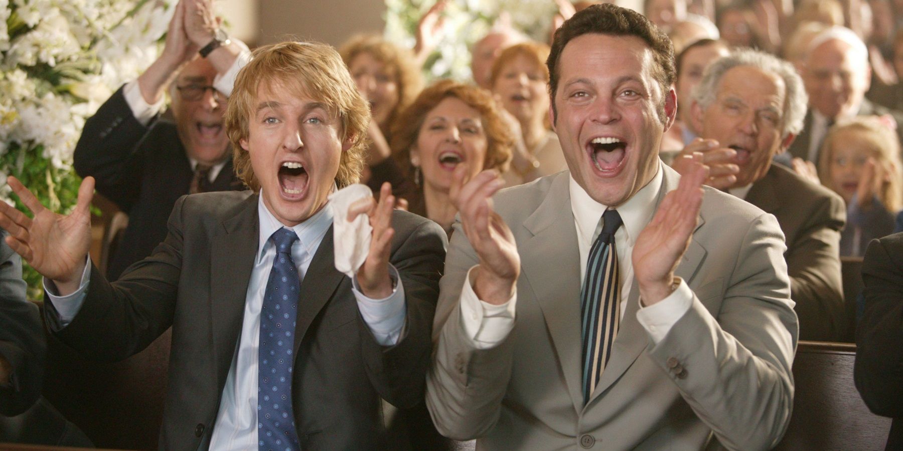 Vince Vaughn and Owen Wilson at a wedding in Wedding Crashers