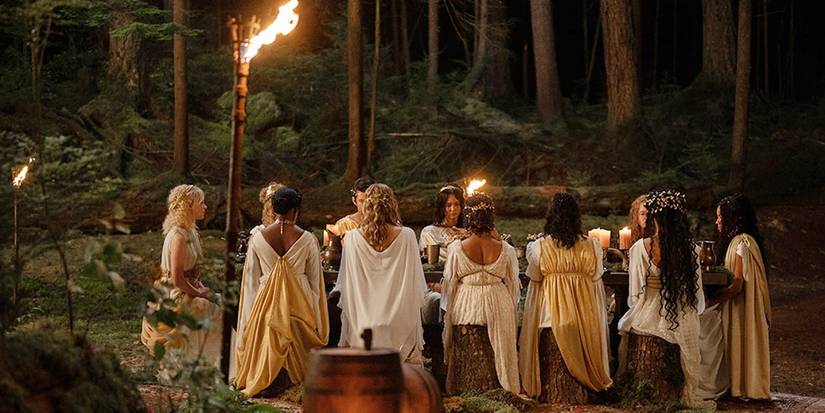 The girls of Yellowjackets sit down to a feast in season 2, episode 2