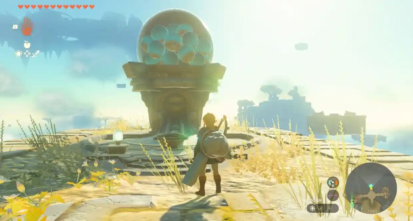 Zonai Parts Dispenser In Zelda TOTK, looking like a big gumball machine with Link standing in front of it