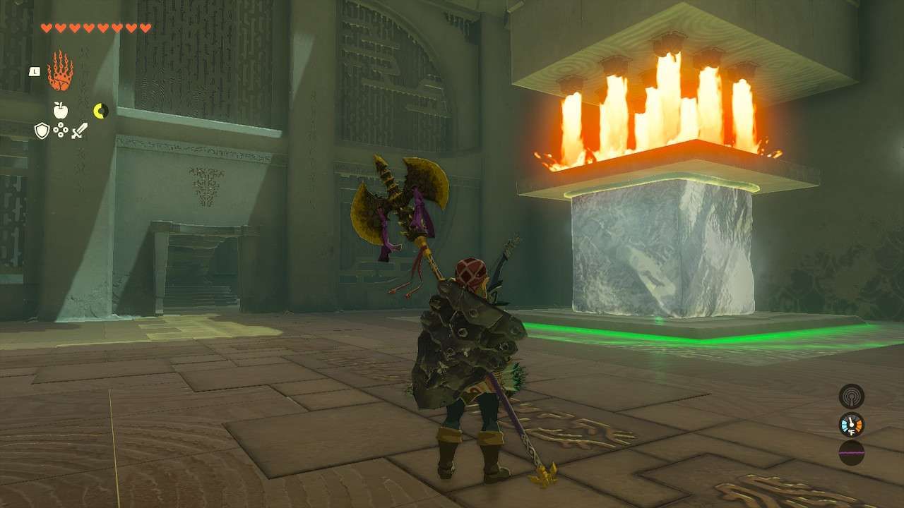 Link standing in front of an Ice block with a stone slab protecting it from fire in Zelda TOTK