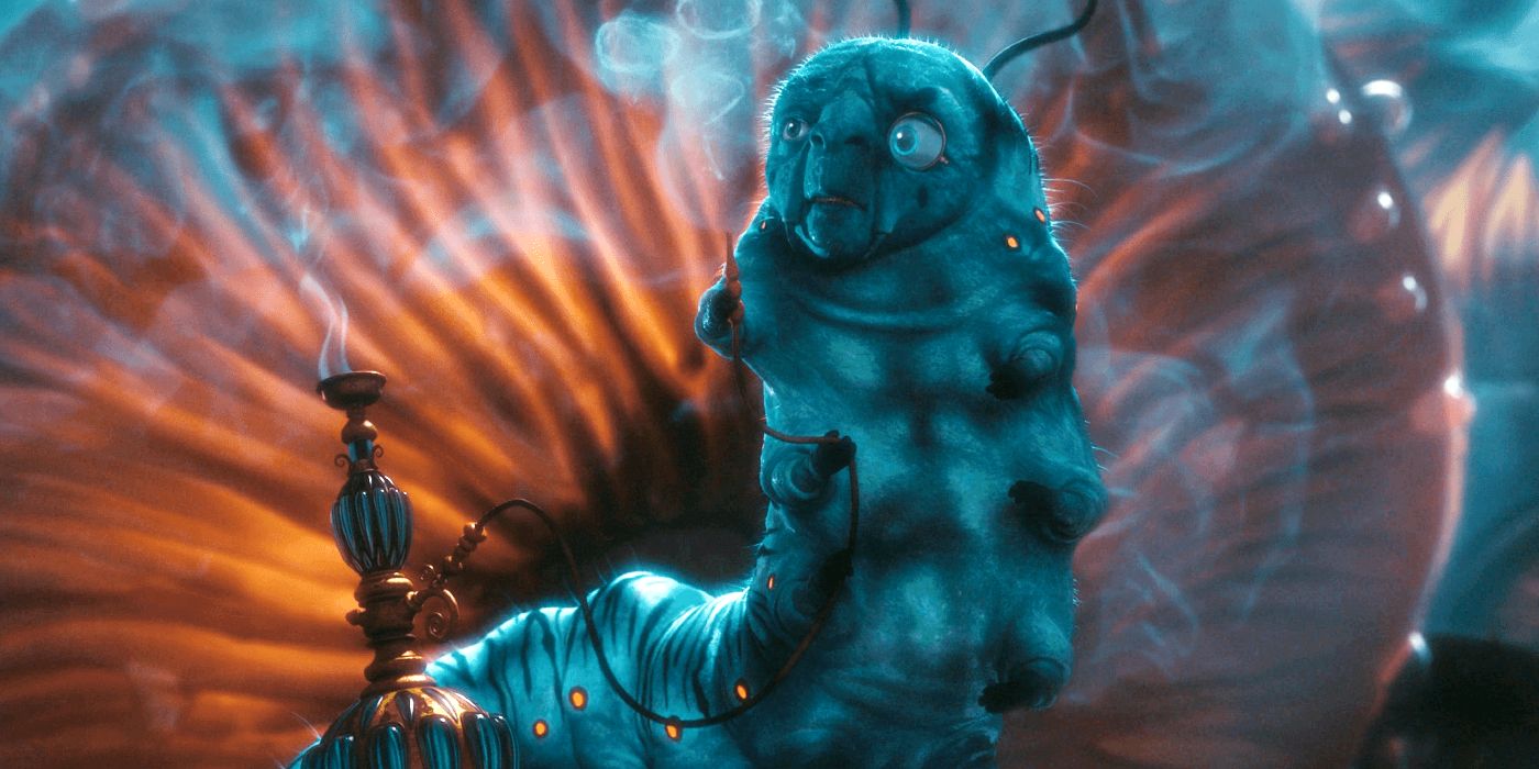 Absolem the Caterpillar smokes a hookah in front of a mushroom in Tim Burton's Alice in Wonderland.