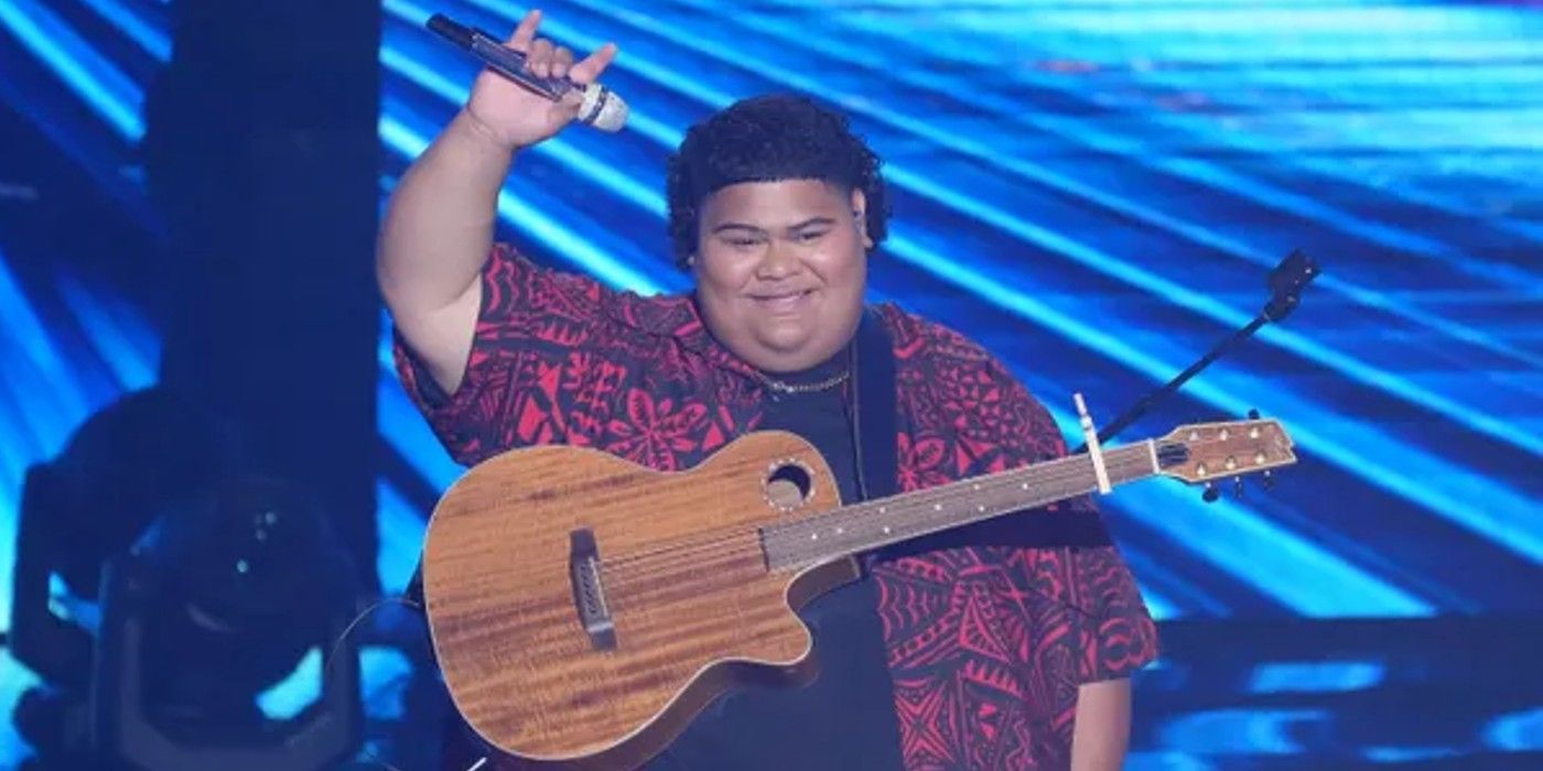 American Idol Iam Tongi Winner smiling with guitar