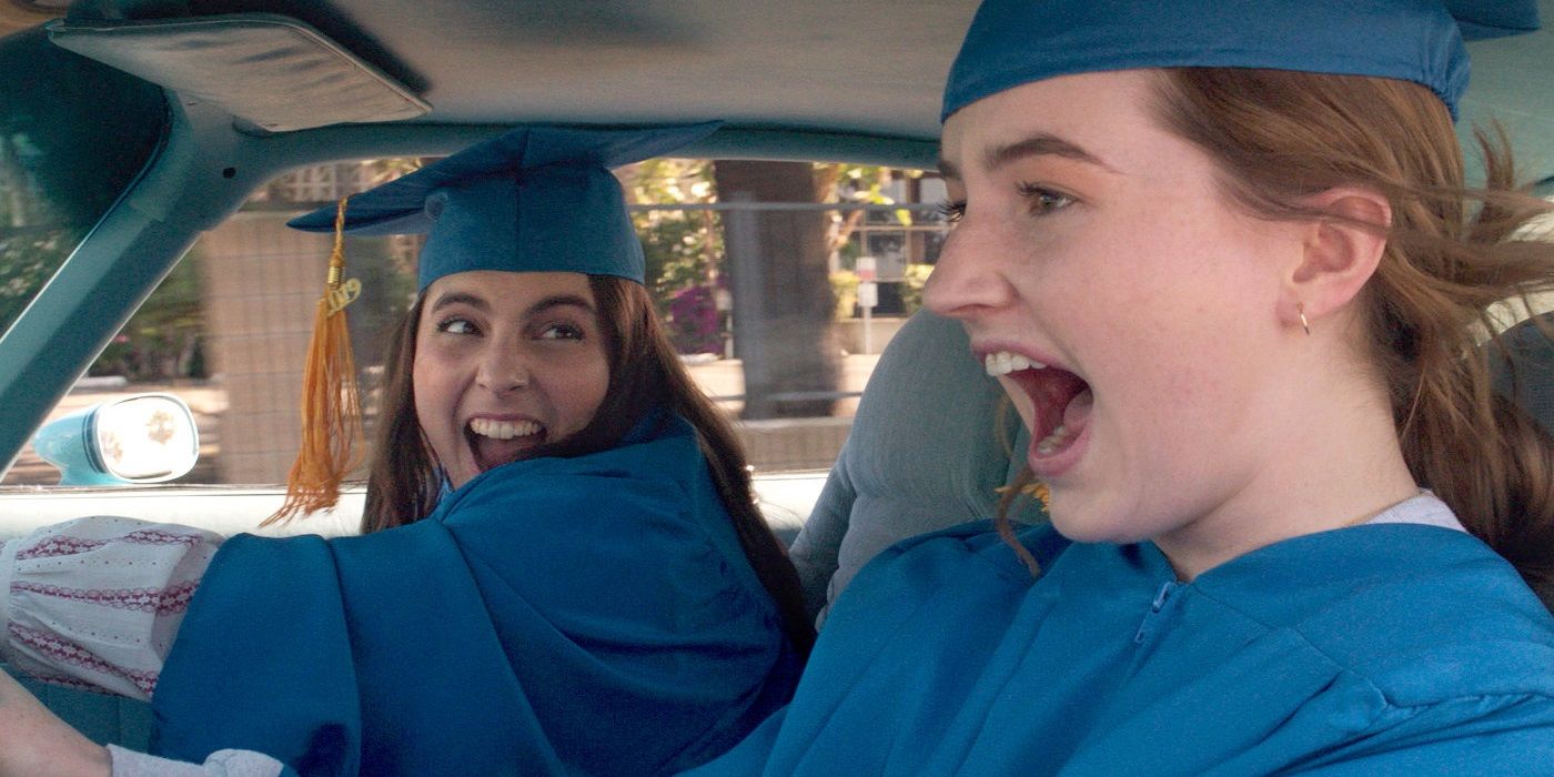 Amy (Kaitlyn Dever) and Molly (Beanie Feldstein) drive to graduation in Booksmart.