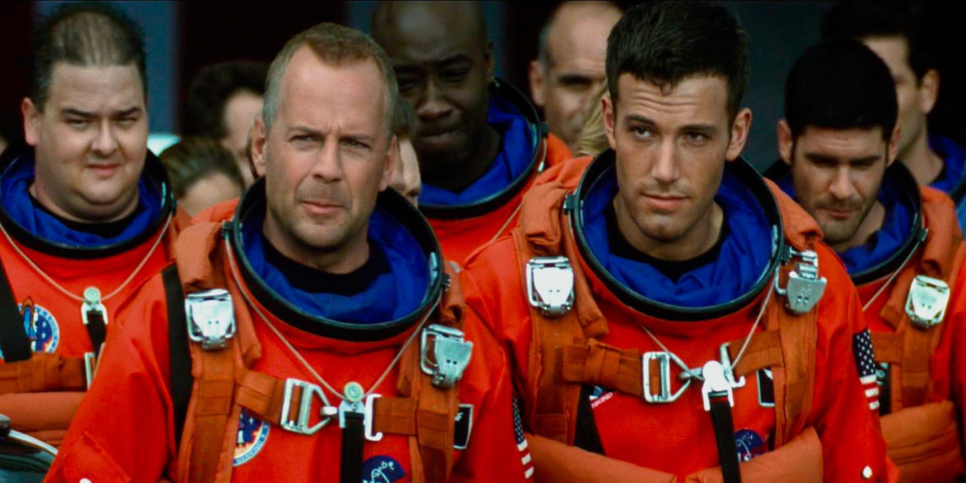 Bruce Willis and Ben Affleck with other drillers turned astronauts in Armageddon