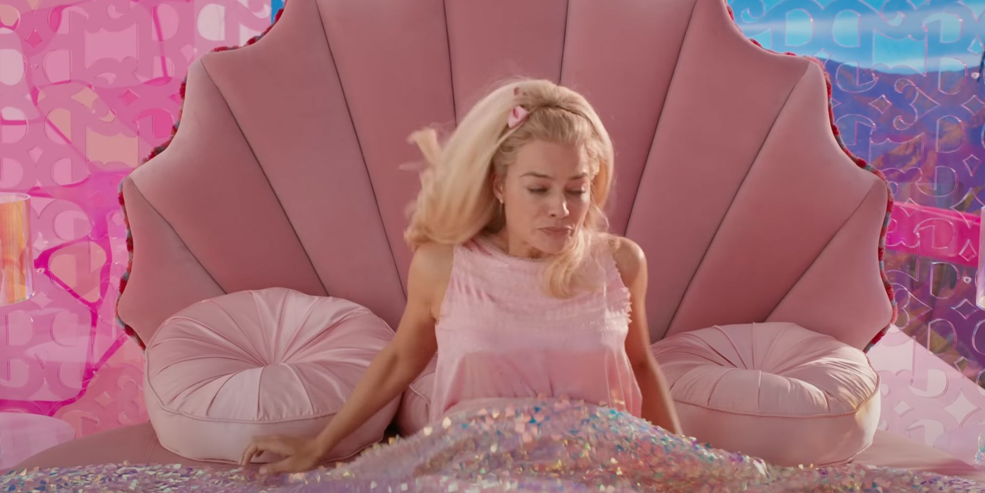 Barbie waking up in bed