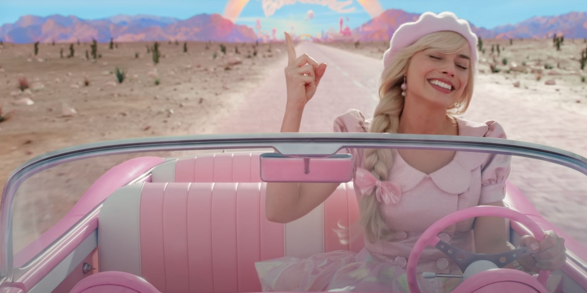 Barbie riding in a car