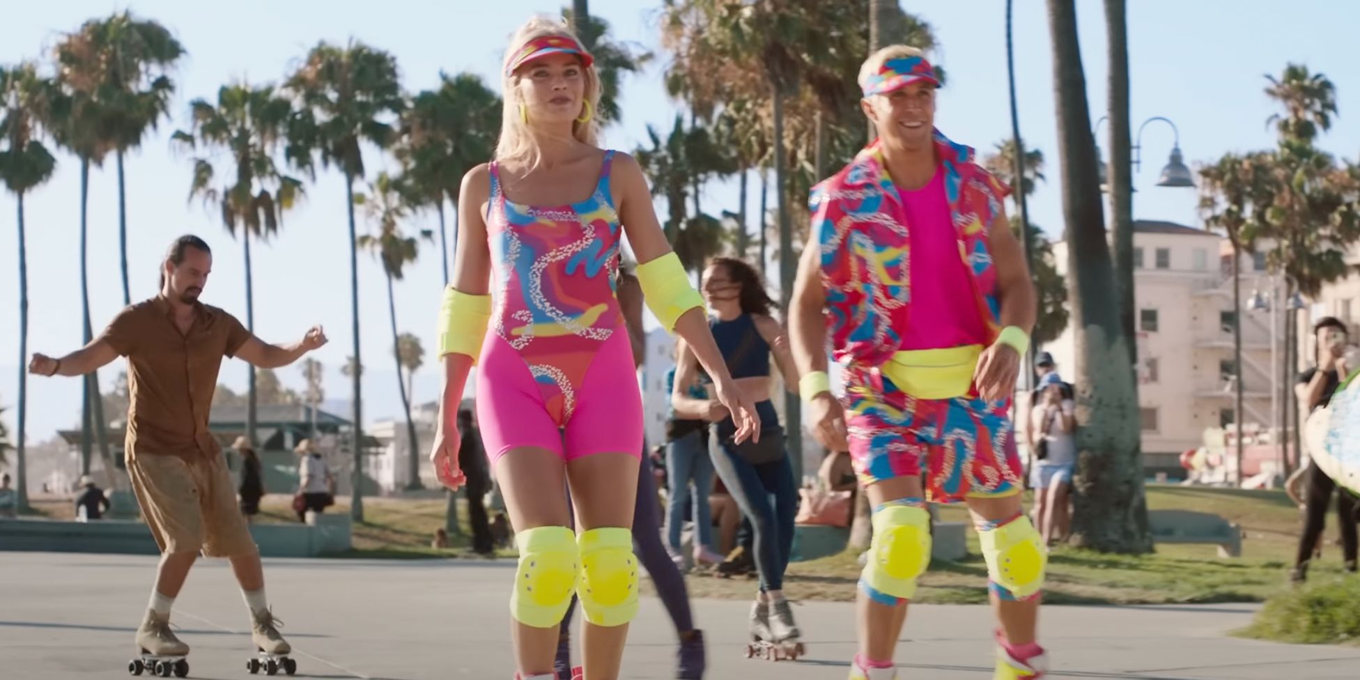 Barbie and Ken roller blading down Venice Beach