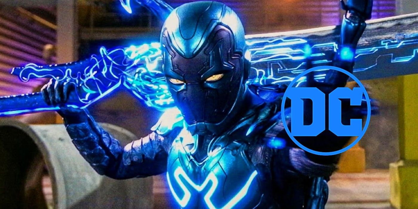 Blue Beetle in a scene from the movie's trailer with his left hand open and the DC logo on it.