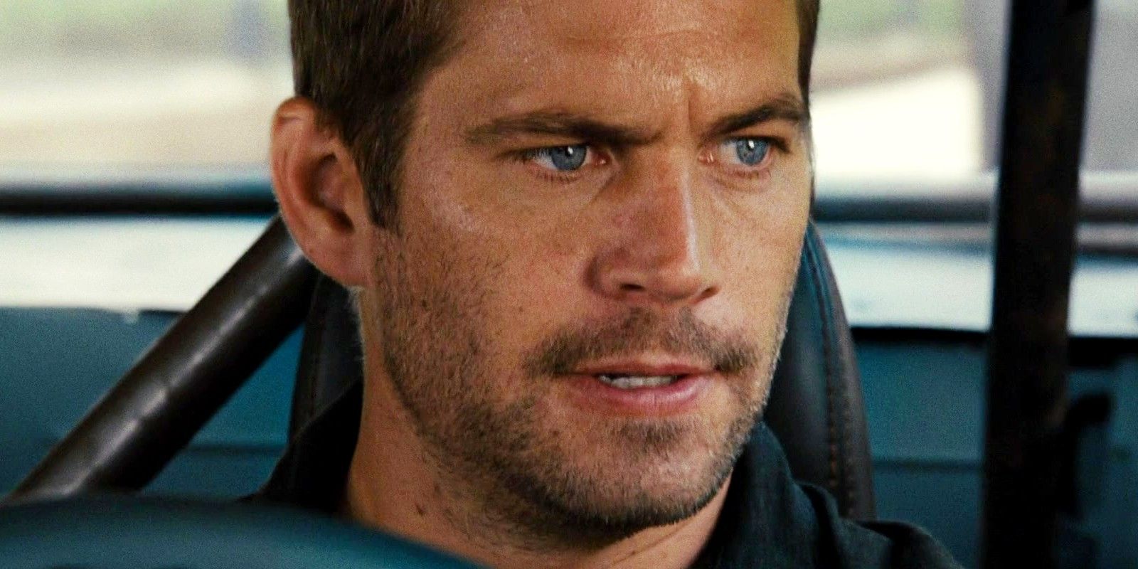 Brian looking to the side concerned in Fast Five