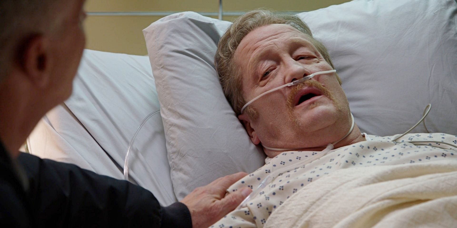 Mouch in the hospital during the Chicago Fire season 11 finale.