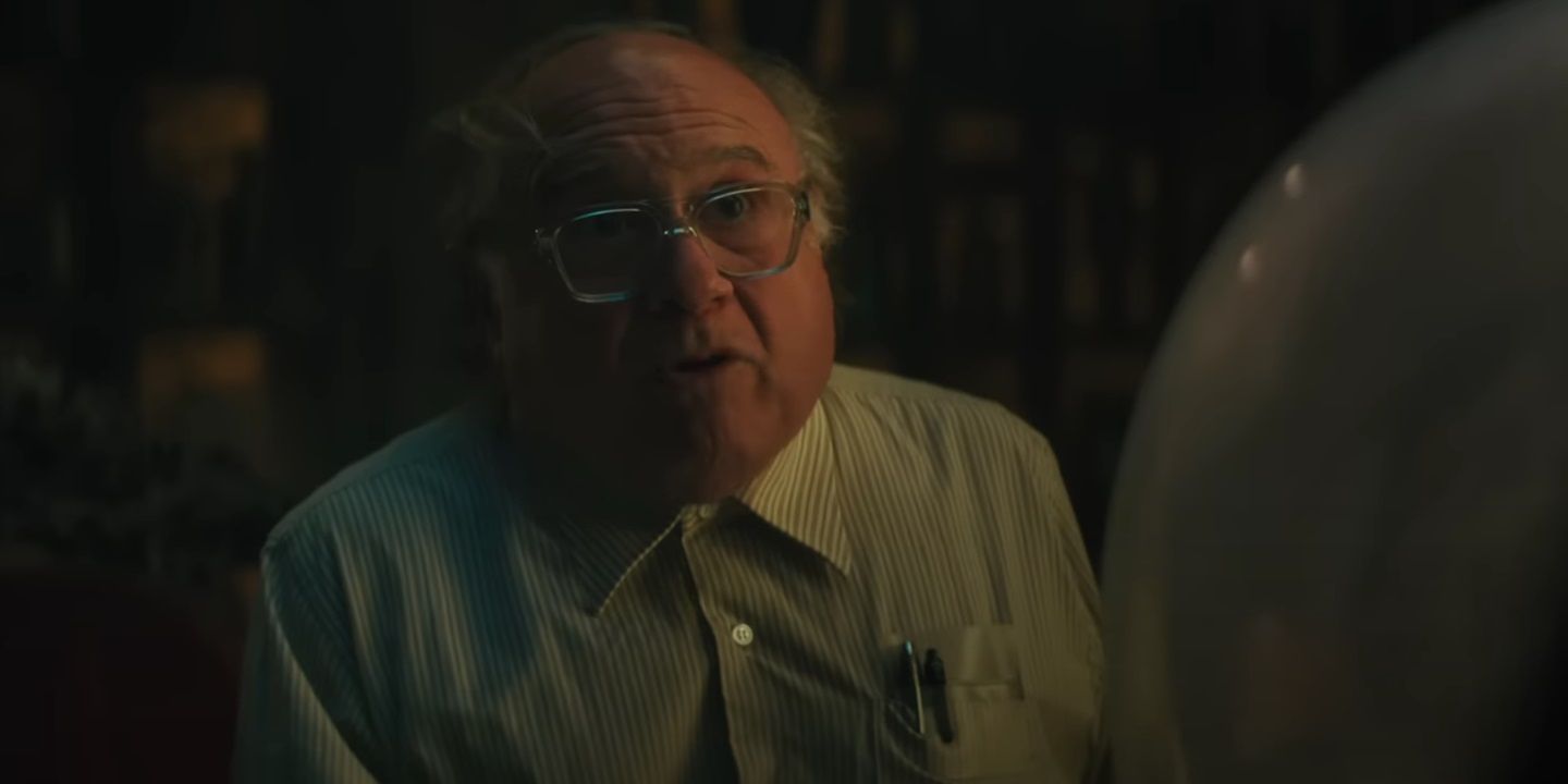 Danny DeVito looking up in Haunted Mansion
