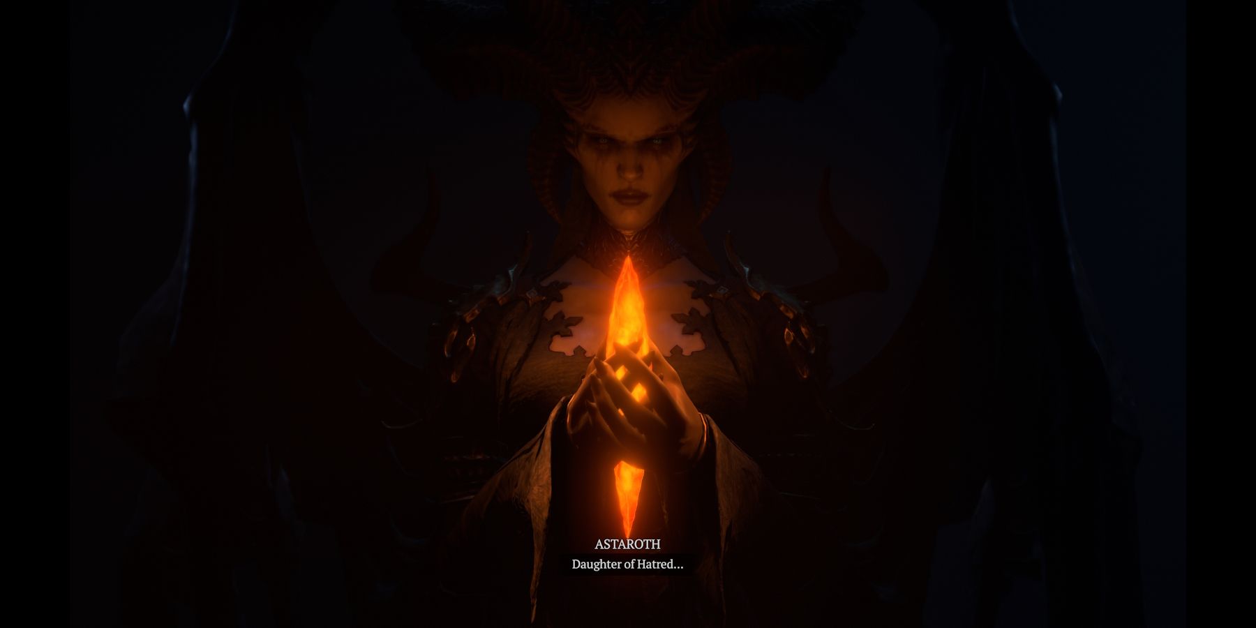Diablo 4 Lilith Daughter of Hatred berdiri dengan kristal api di tangan
