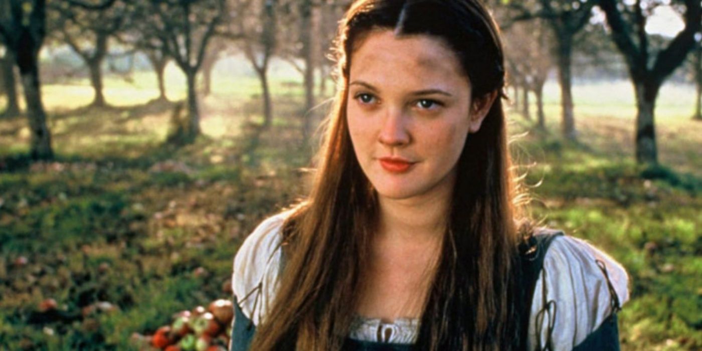 Drew Barrymore as Danielle in Ever After standing in a forest. 