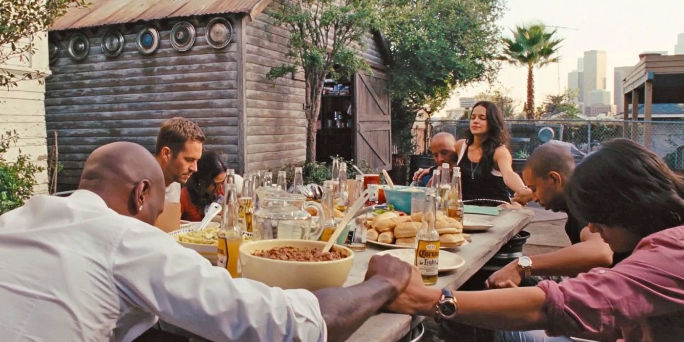 Brian, Mia, Dom, Letty, Han, Tej, and Roman say grace in Fast & Furious 6