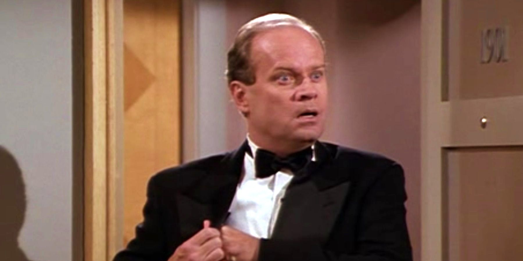 Frasier wearing a tuxedo and looking shocked in Frasier