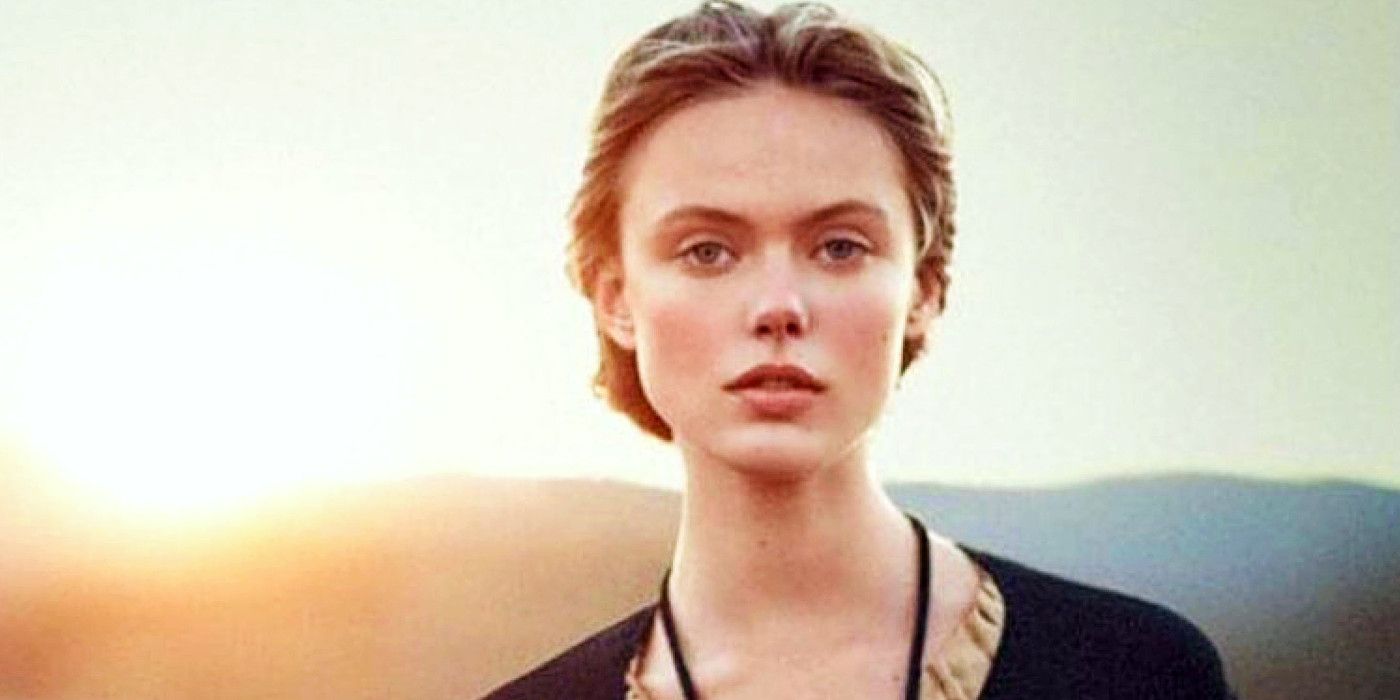 Headshot of Frida Gustavsson with the sun rising in the background