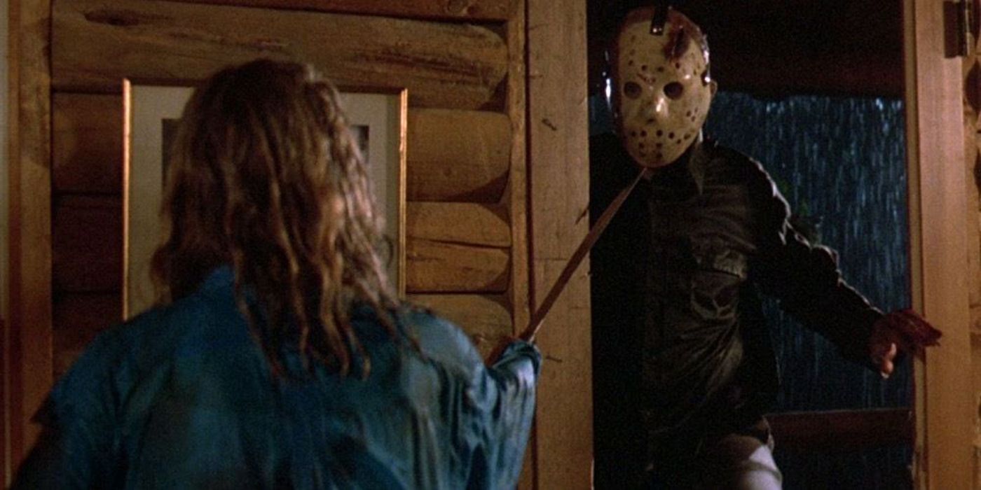 Jason comes through a door and approaches a knife-wielding young woman in Friday the 13th The Final Chapter