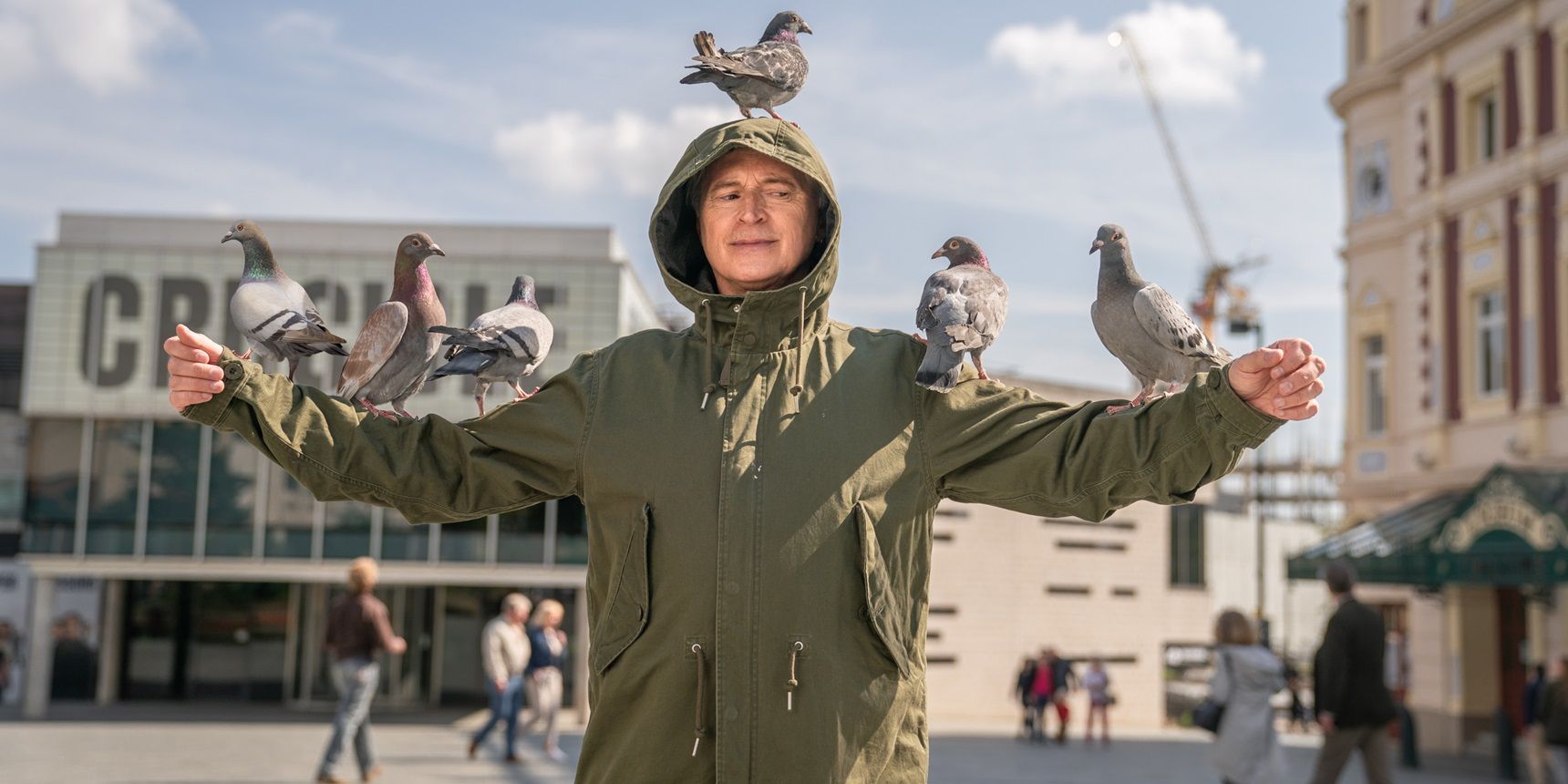 Gaz covered in pigeons in The Full Monty series
