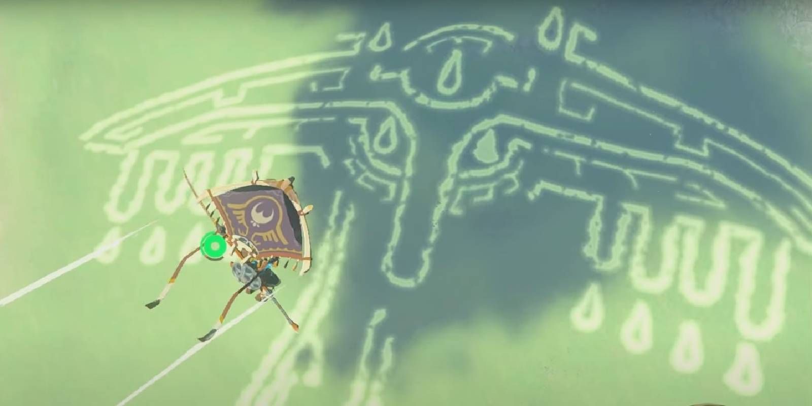 Link on a Paraglider, flying over the Rauru Geoglyph in Zelda: Tears of the Kingdom.