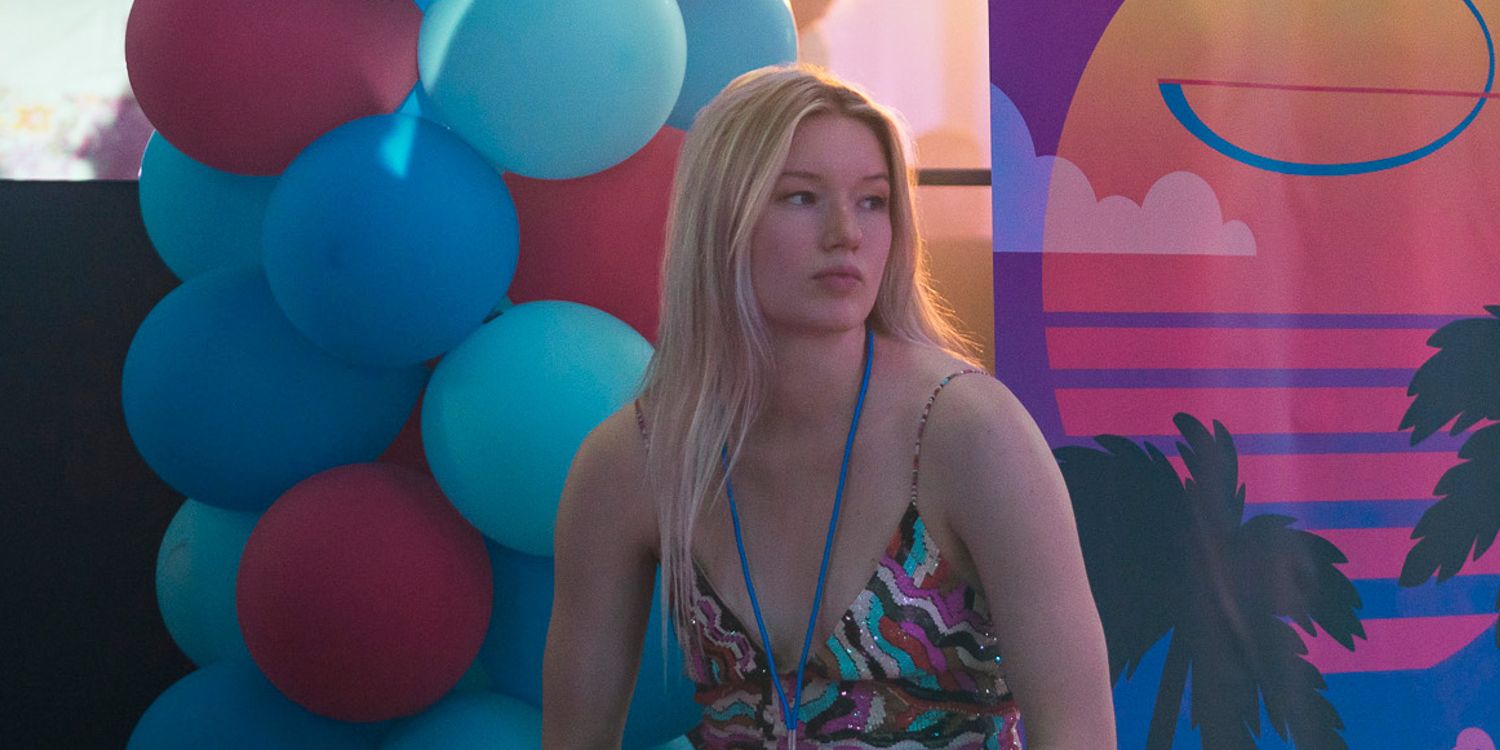 West Duchovny sitting down in Painkiller in front of balloons