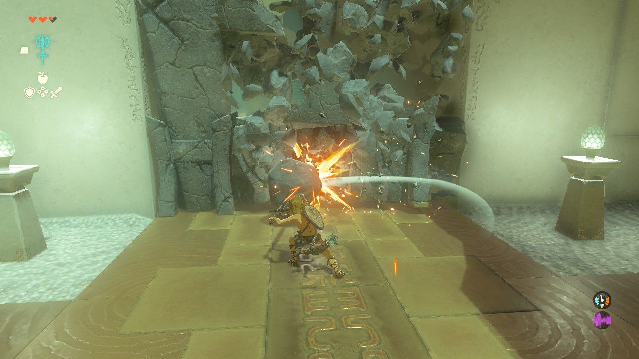 Link breaking through a cracked barrier with his fused weapon in TOTK