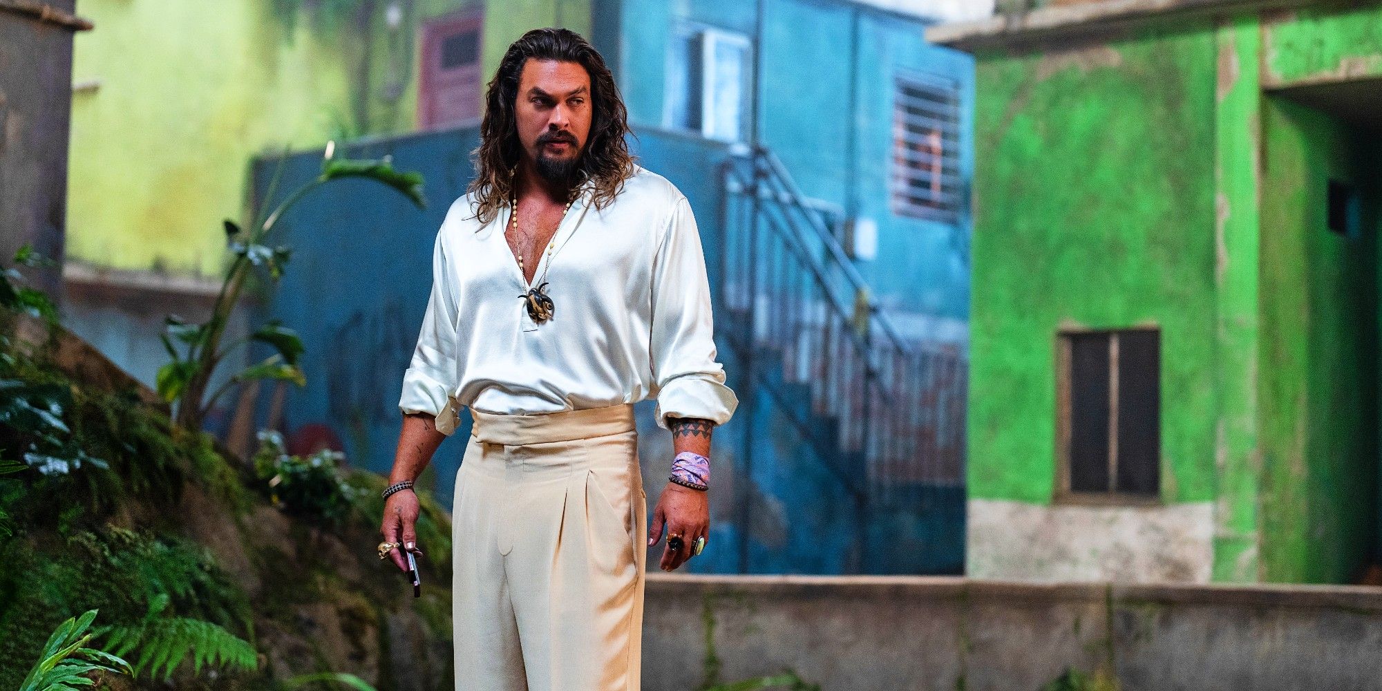 Dante Reyes (Jason Momoa) standing in a favela in Brazil in Fast X