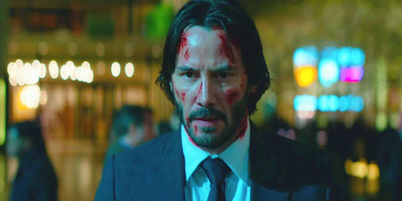 Keanu Reeves with a bloody face in John Wick: Chapter 2.